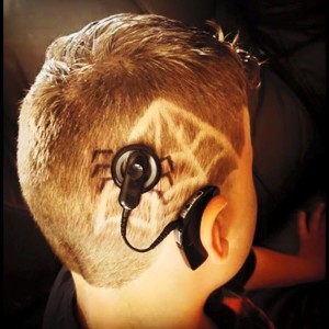 Child with Spider Cochlear Implant and Spider Web Haircut
